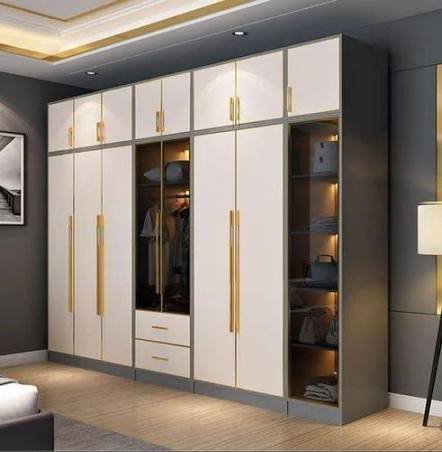 White custom modular GI steel wardrobe with loft and open shelves